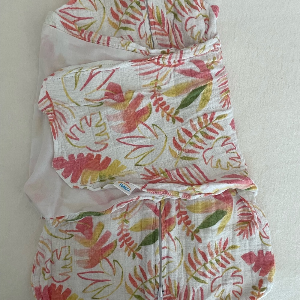 Halo Baby Sleep Sack Swaddle in White with Pink, Green and Yellow Leaf Print